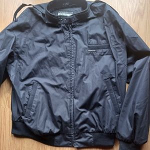 Vintage men's Members Only navy jacket. Size L.